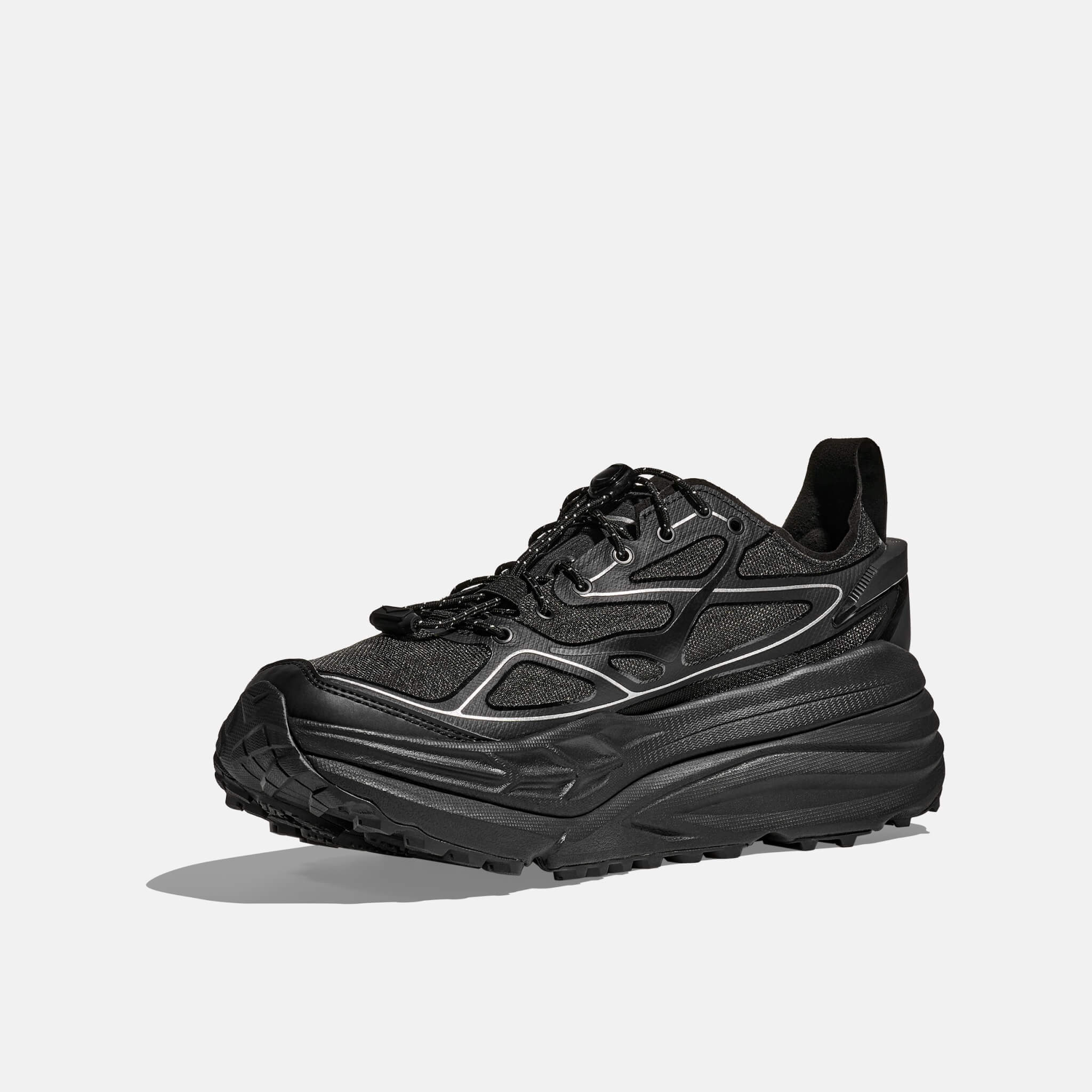 Unisex černo-stříbrné tenisky Hoka Stinson One7