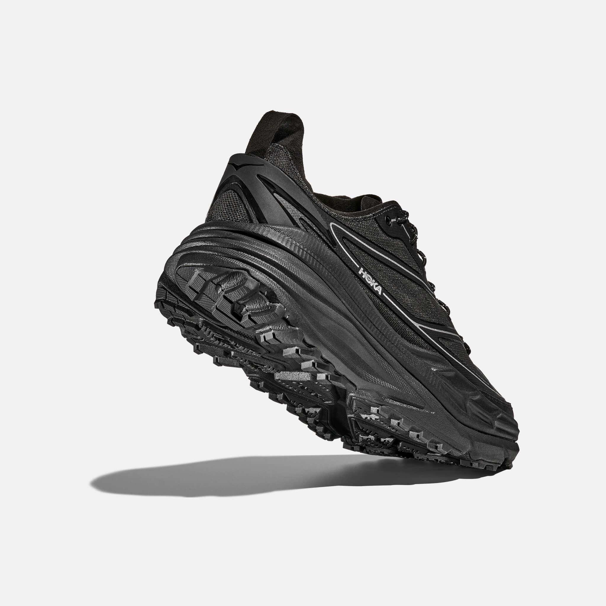 Unisex černo-stříbrné tenisky Hoka Stinson One7