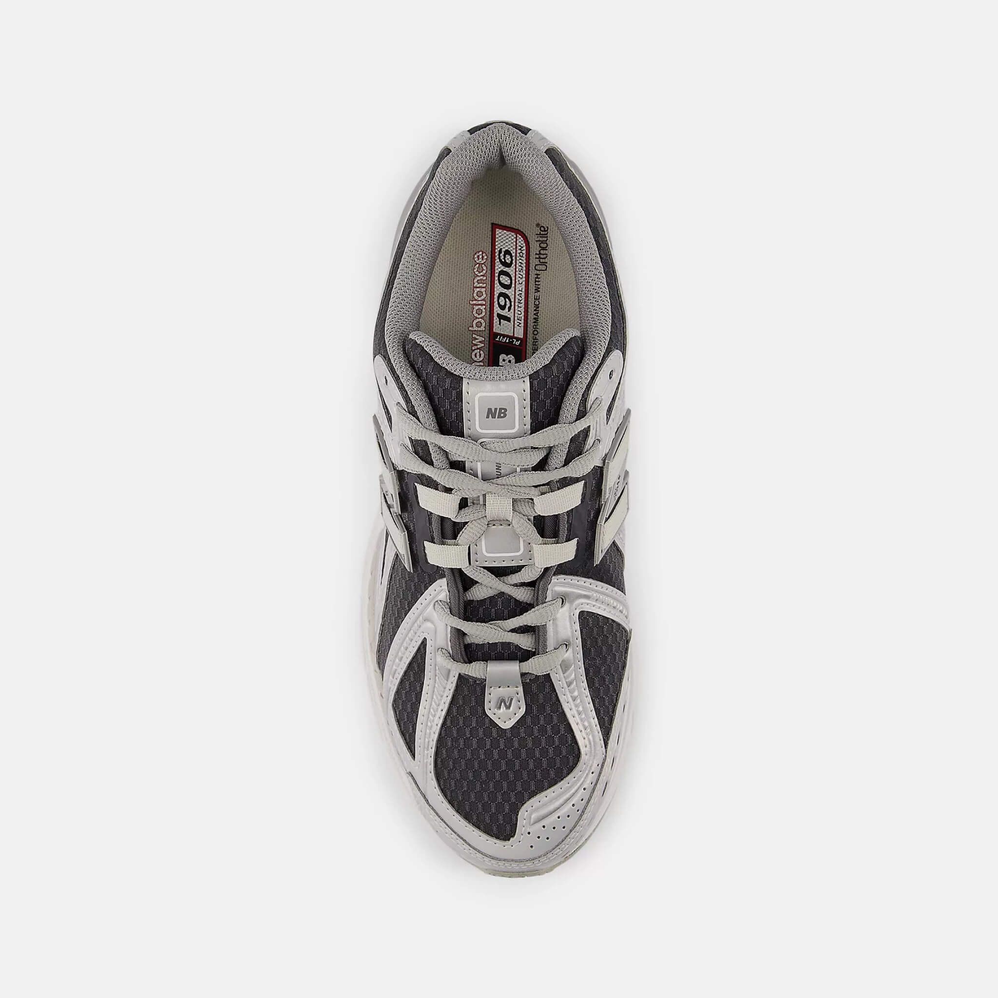 Unisex stříbrno-černé volnočasové tenisky New Balance U1906R