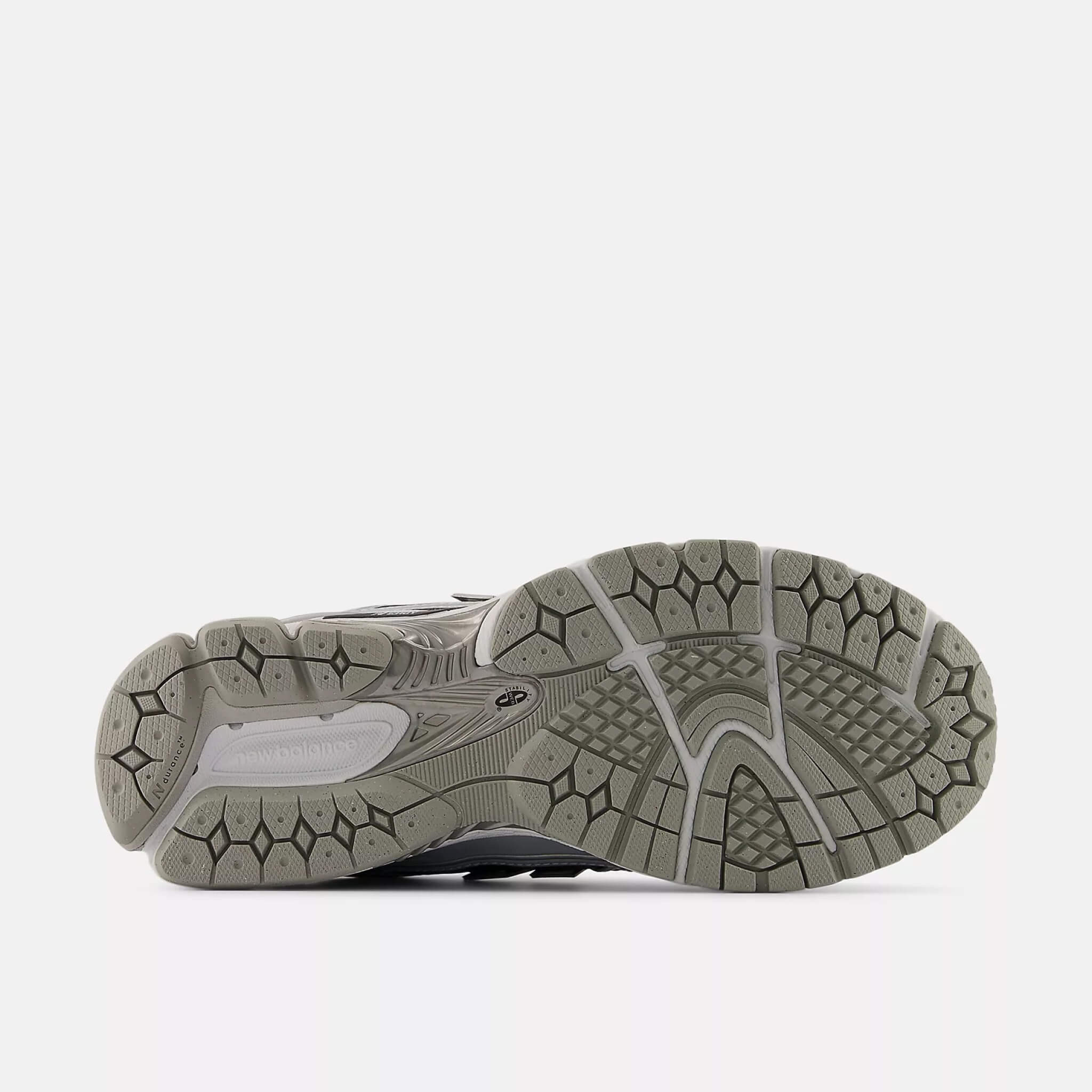 Unisex stříbrno-černé volnočasové tenisky New Balance U1906R