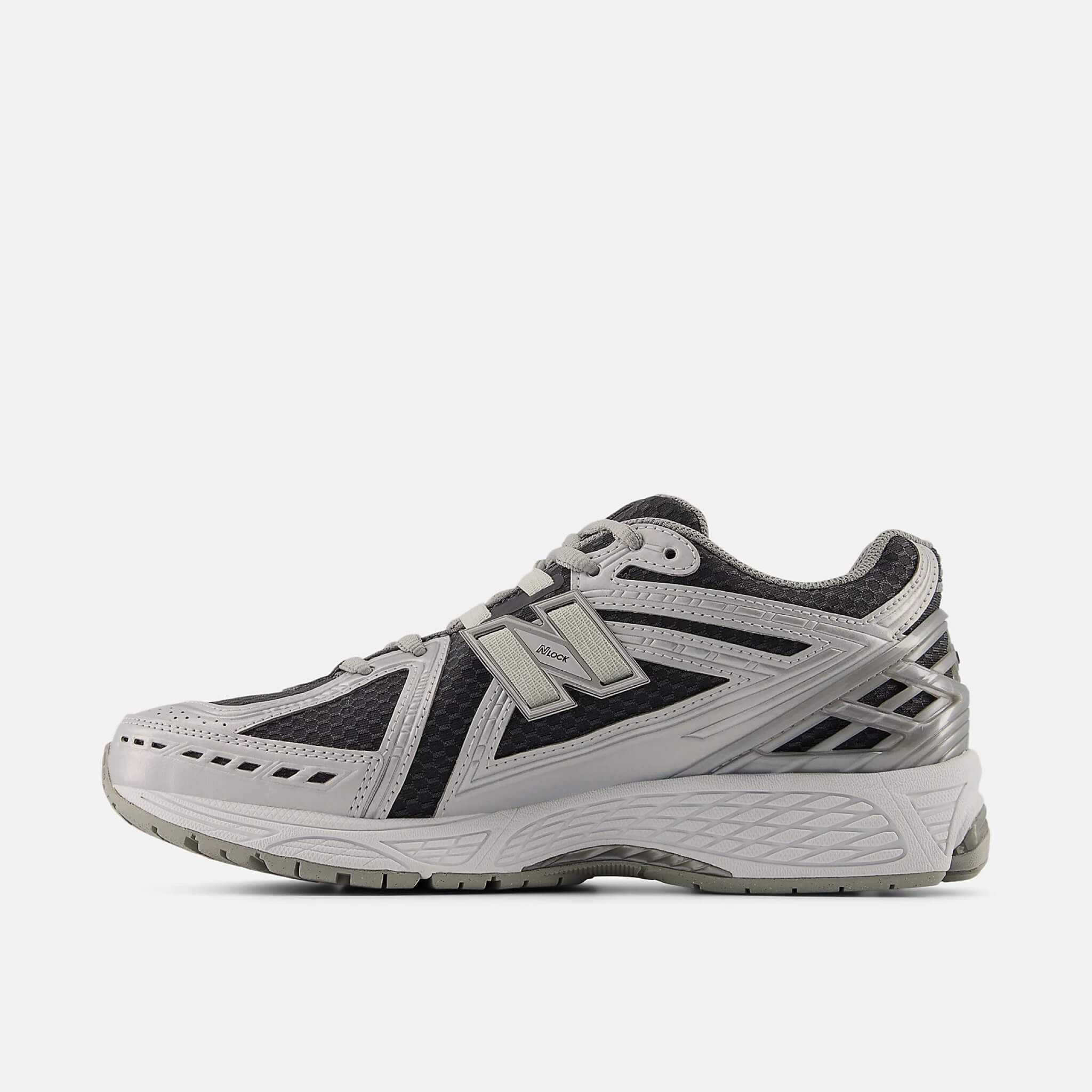 Unisex stříbrno-černé volnočasové tenisky New Balance U1906R