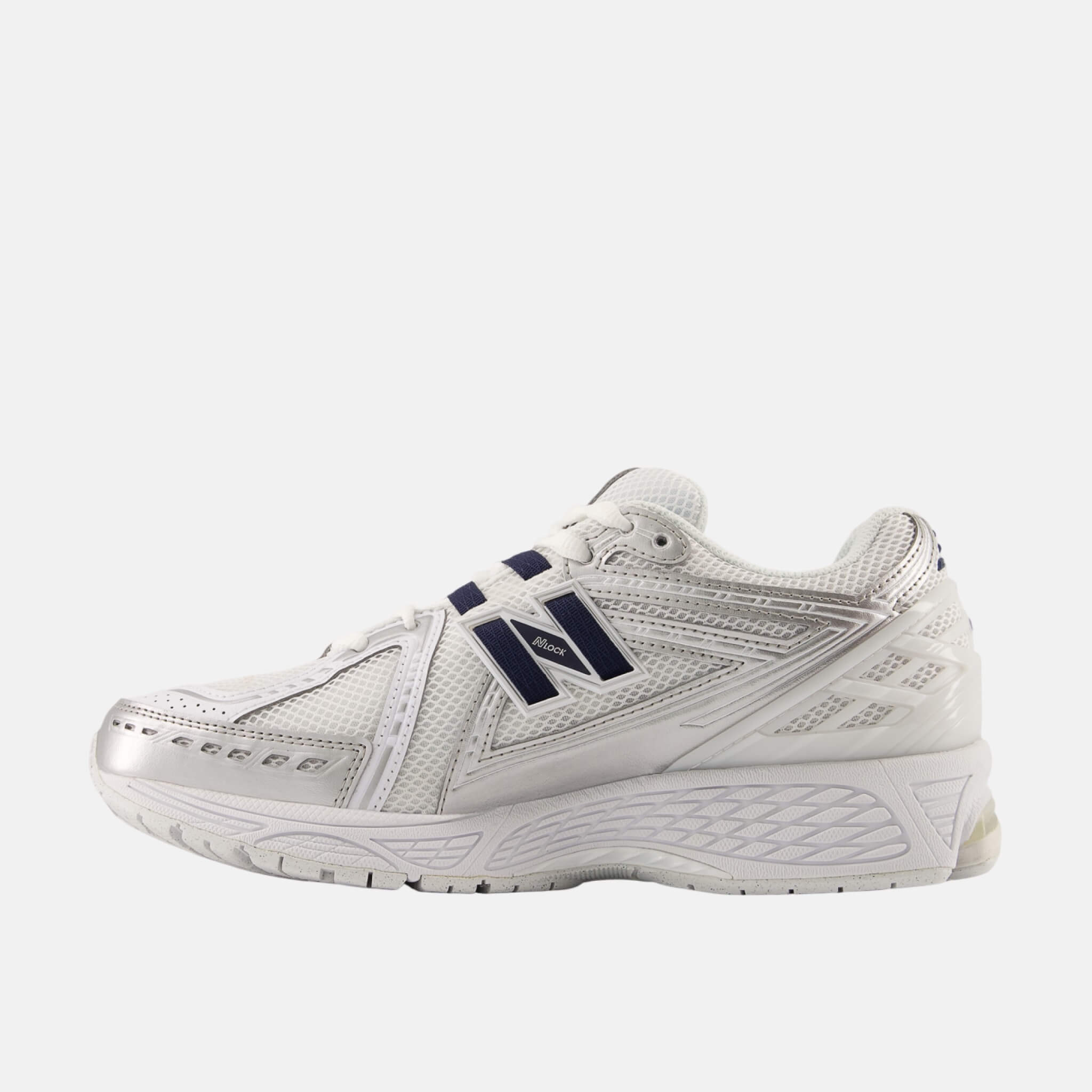Unisex stříbrno-bílé volnočasové tenisky New Balance U1906R