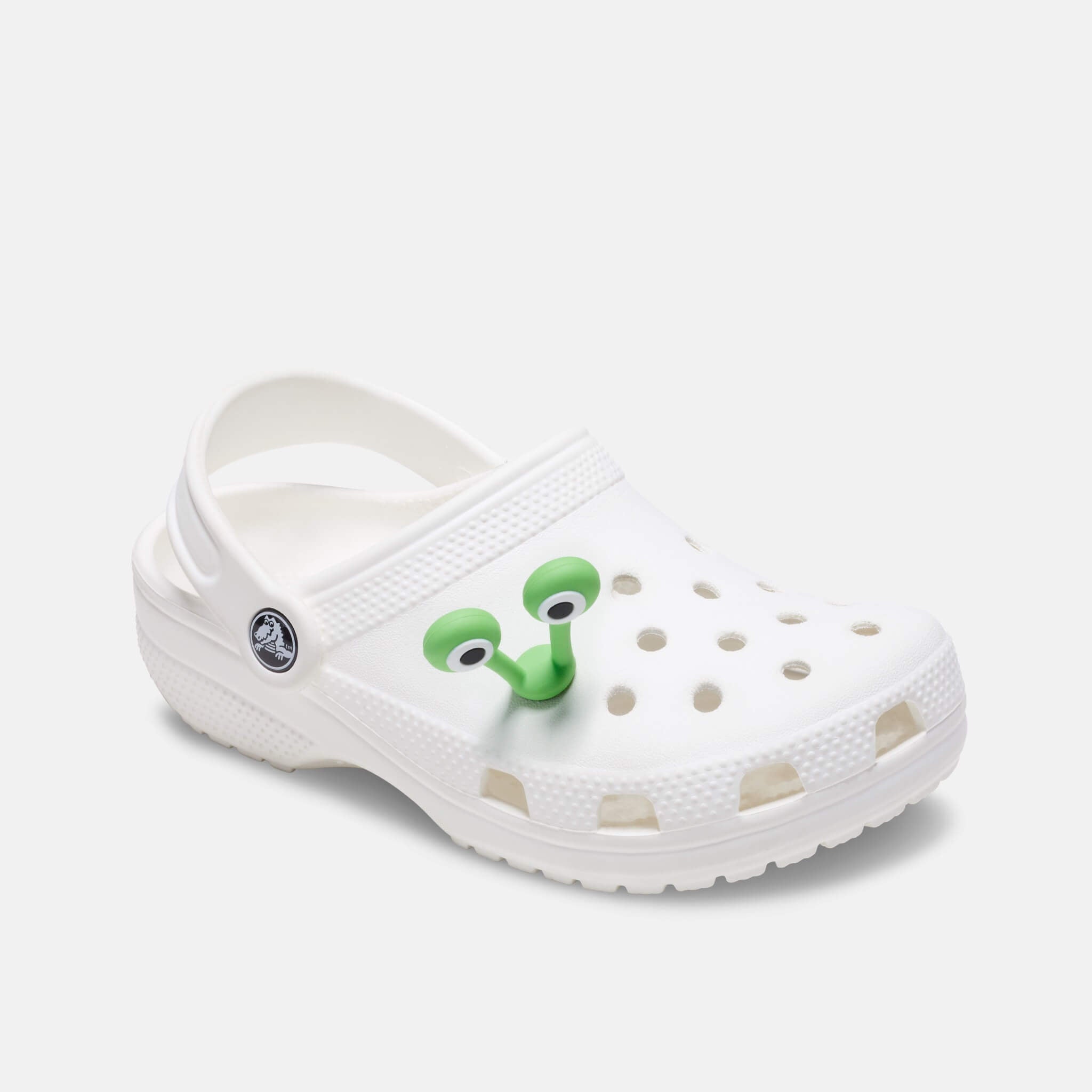 Odznáček Jibbitz – Green Creature Eyes