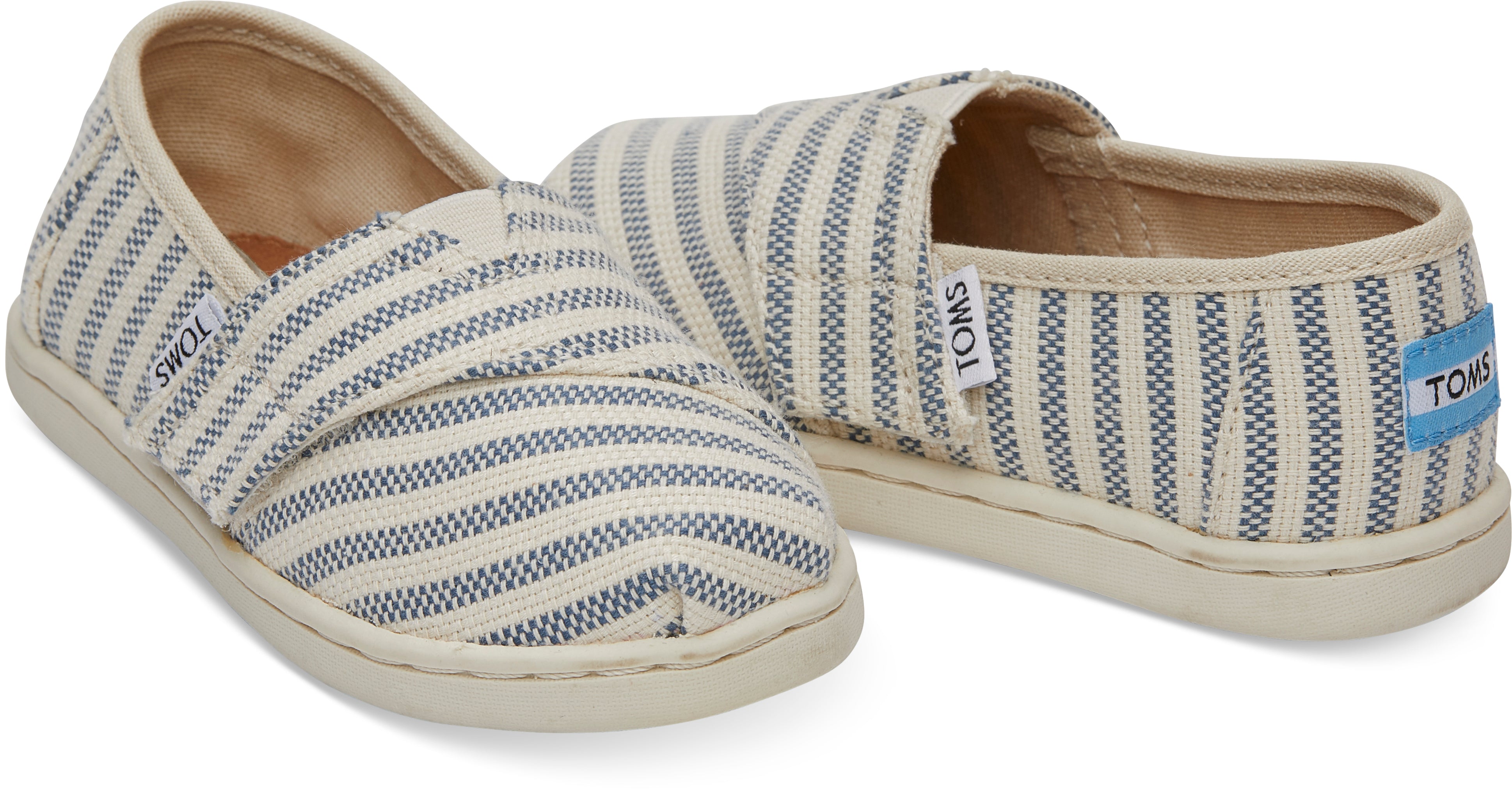 Dětské krémovo-modré TOMS Stripes Seasonal Classics Tiny Alpargata